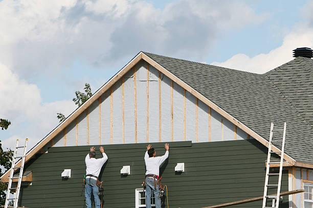 Professional Siding Installation technician working in Powhatan, VA